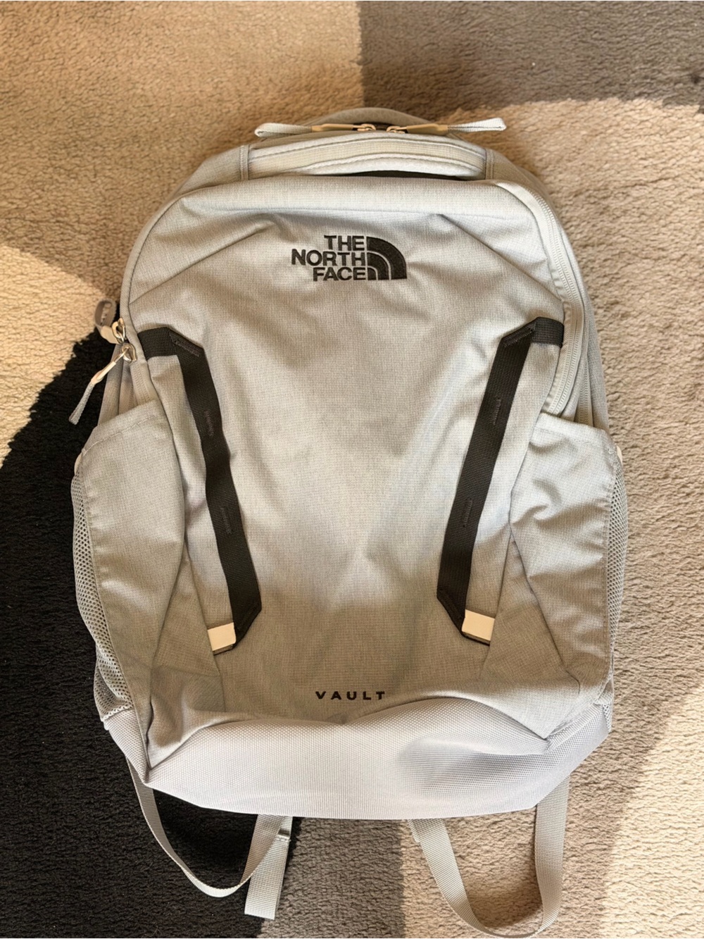The North Face Vault Backpack in Light Gray with Black Accents